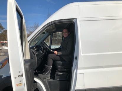 claudia hehr in driver seat of van